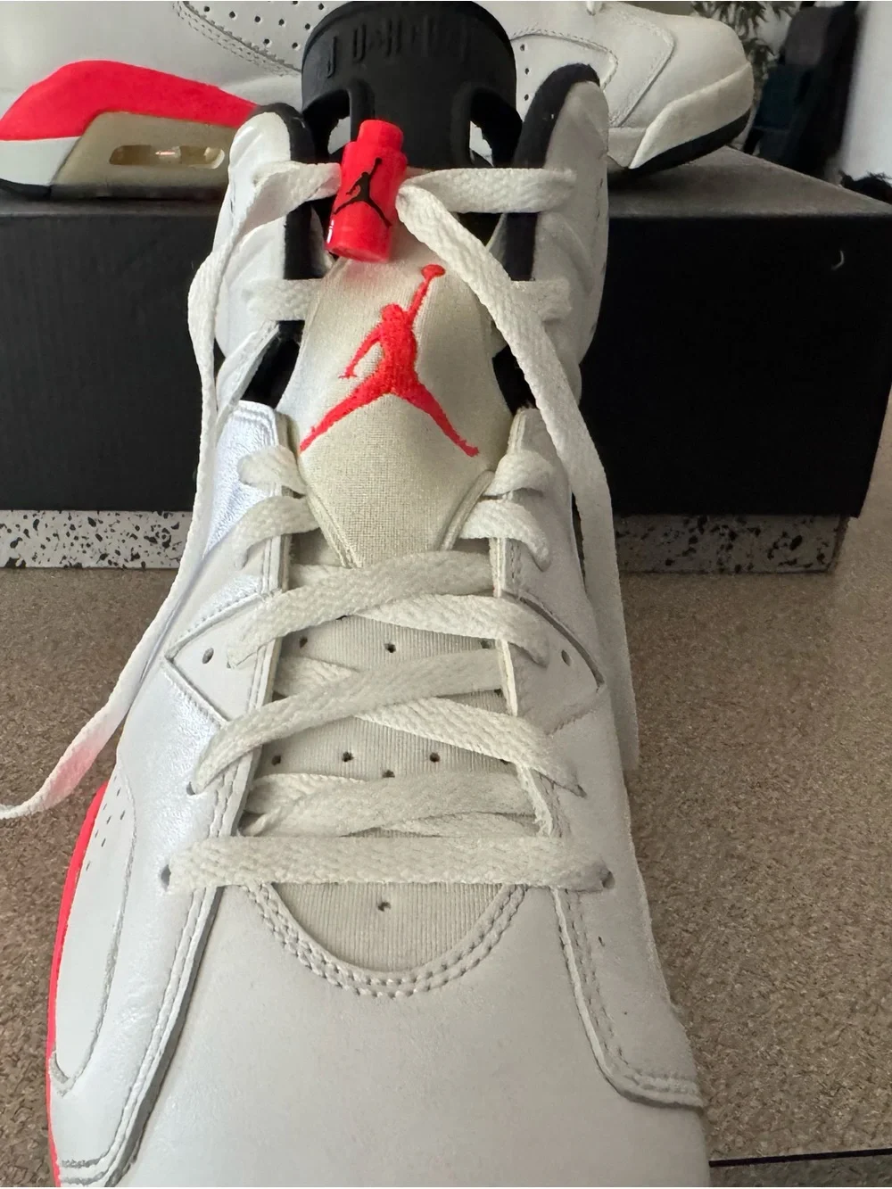 Jordan White Sneakers with Red Jumpman Accents